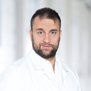 Dr. med. (i) Valentino Monaco